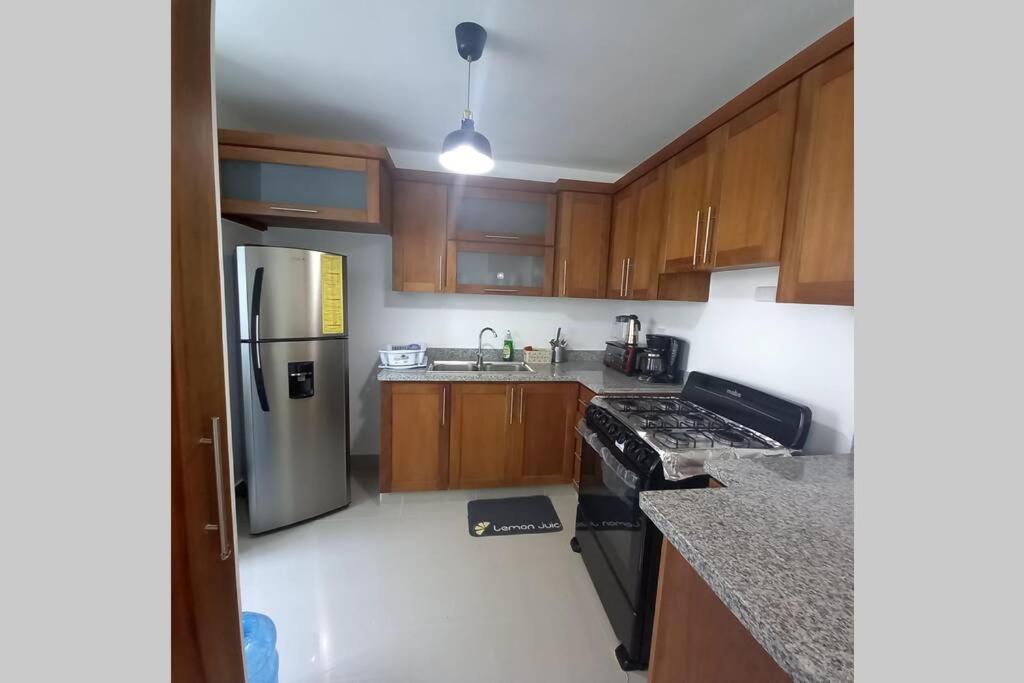 Confortable Apartamento De 3 Tres Habitaciones, Con Hermosa Vista De Area Verde, Ademas De Piscinas Y Juegos Infantiles En Area Recreativa 圣地亚哥洛斯卡巴 外观 照片